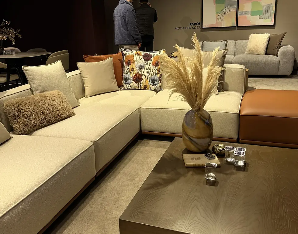 cream-modular-sectional-cognac-leather-ottoman.webp