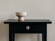 Premium furniture detail black side table ceramic bowl modern home 2026