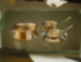 A set of copper cookware with brass handles reviewed as one of the best non-toxic cookware brands in the US for 2026