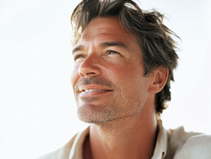 a man looking off to the side