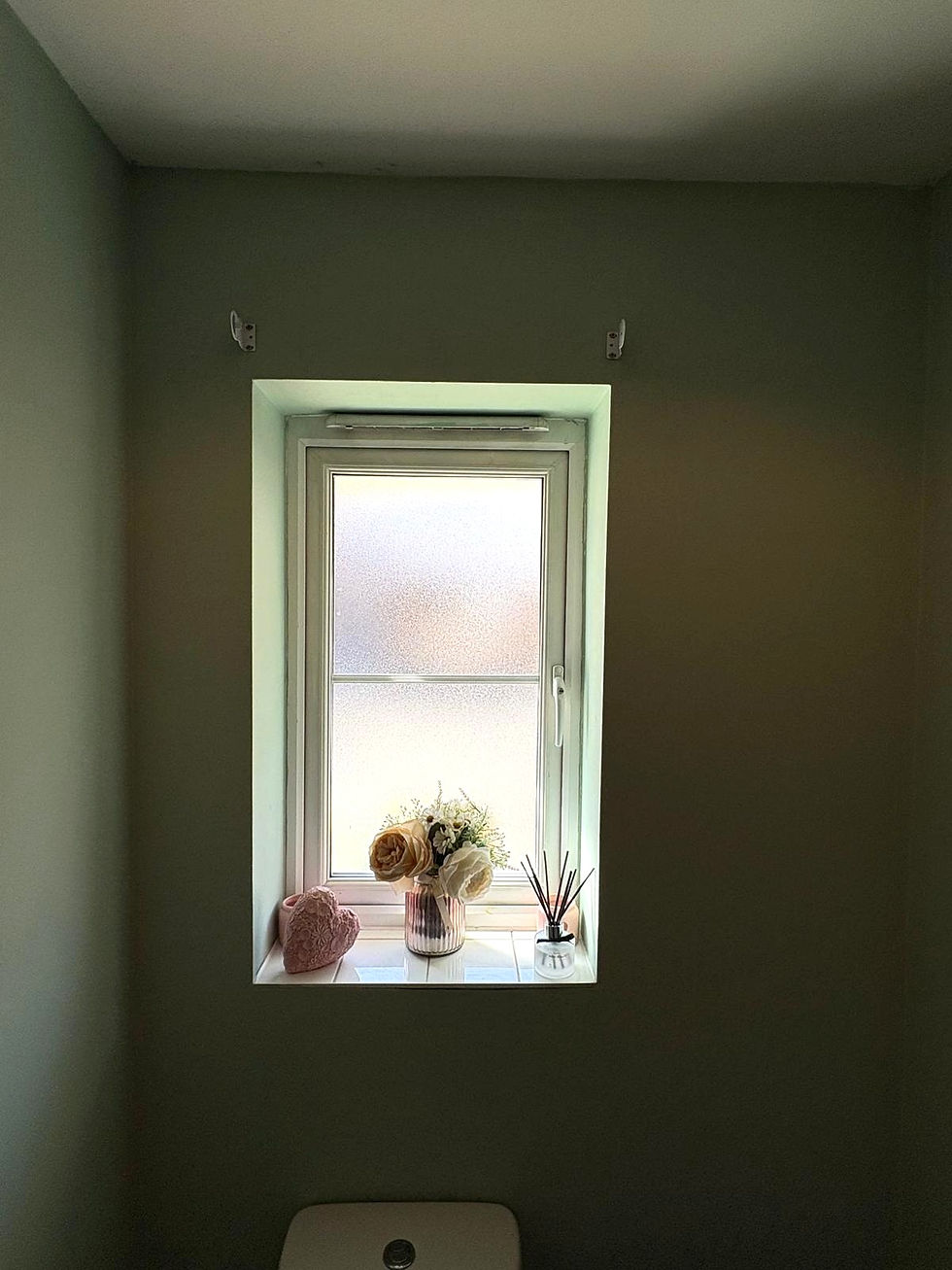 Roller blind brackets fitted above window in Sevenoaks