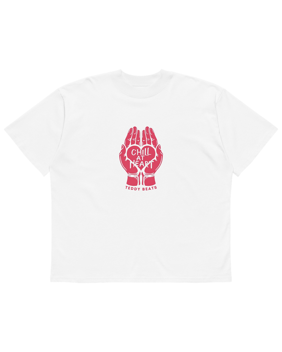 Thumbnail: Person wearing a white t-shirt with 2 red hands holding a heart that says Chill at Heart inside it and Teddy Beats below