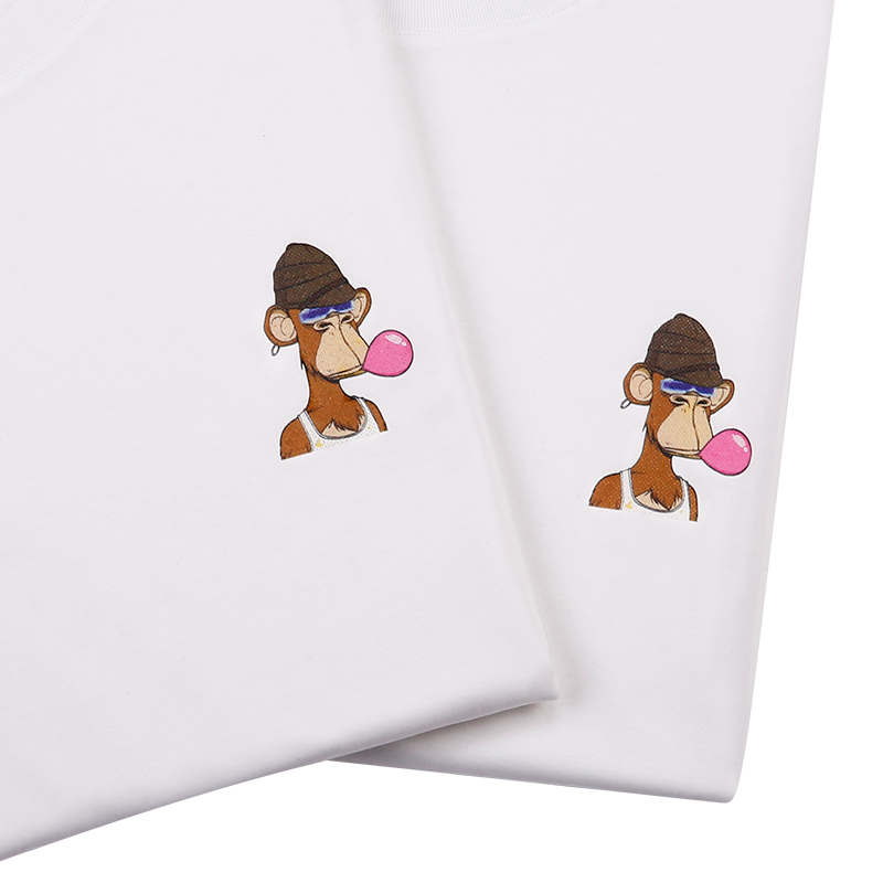 Thumbnail: Travis’ tee is white