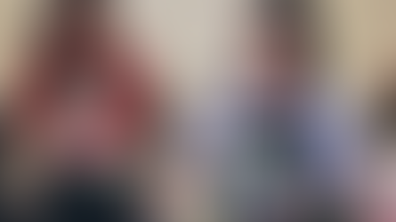 Two women volunteering at Food Cycle, spooning soup into a bowl.