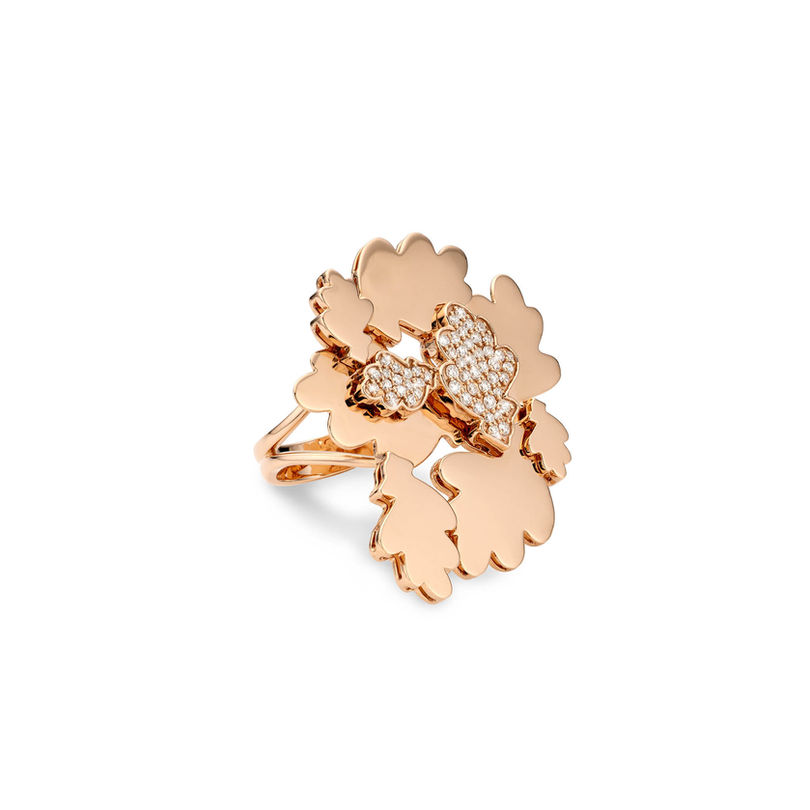 left view of bold rose gold ring set pavé with diamonds, inspired by a floor covered with oak leaves