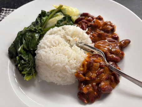 LIBERIA: Beans Gravy and Collards with Cabbage over Rice
