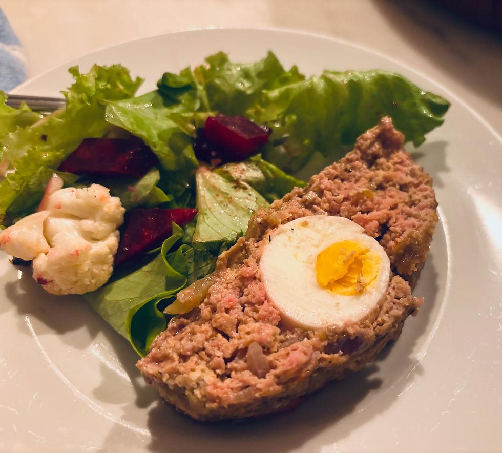 egg-stuffed meatloaf and salad