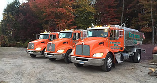 3 of our Curtiss Oil trucks