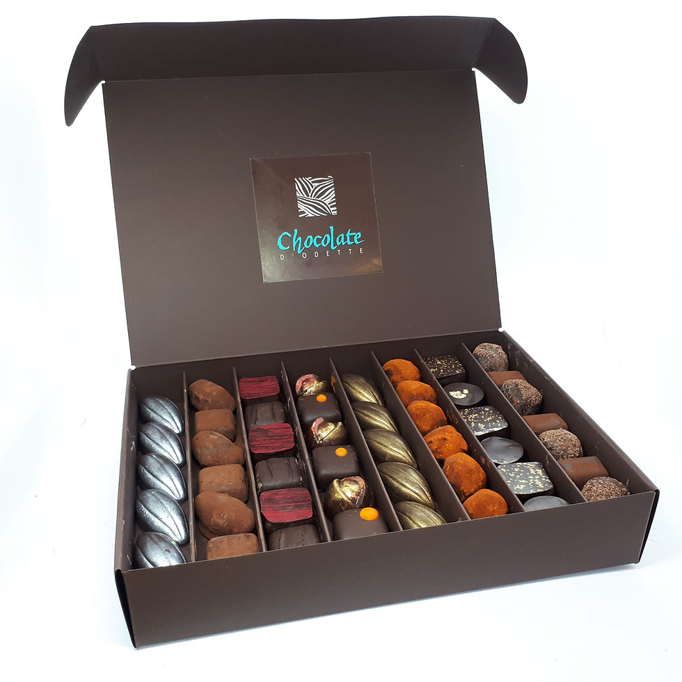 Miniatura: Sortido de 42 trufas e bombons com sabores frutados, puros chocolate e espirituosas.