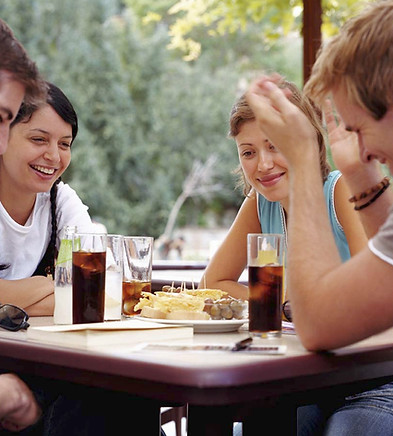 4 people having lunch and talking