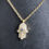 Thumbnail: 14KT Yellow Gold Diamond And Sapphire Small Hamsa Necklace