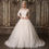 Thumbnail: Modest A-line wedding gown with lace