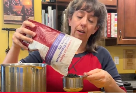 Dr. Heather making homemade elderberry syrup