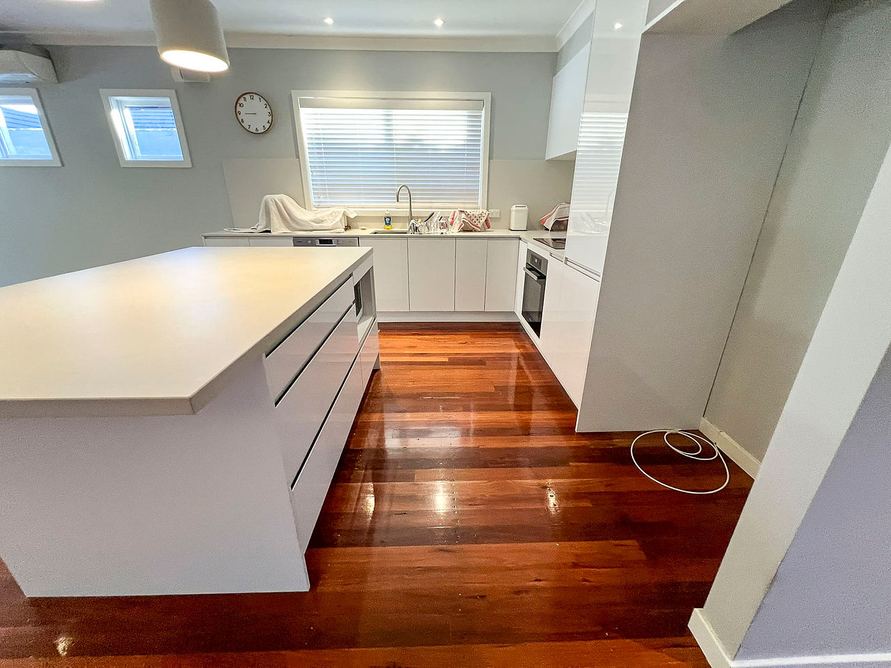 Sydney Blue Gum floors showing darker tones and mismatched timber footprint after kitchen renovation