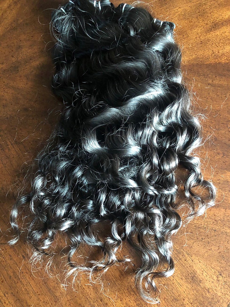 Thumbnail: WAVY/CURLY