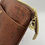 Thumbnail: Gold zipper pull and zipper end