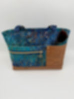 Beautiful blues and brown small tote/shoulder bag, great for all day use or travel.