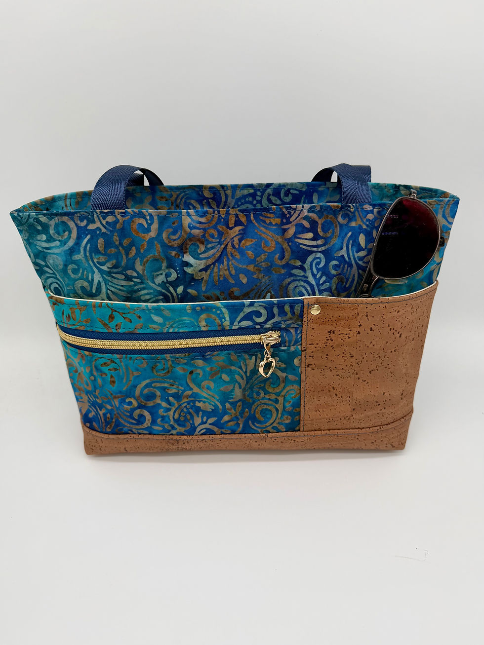 Beautiful blues and brown small tote/shoulder bag, great for all day use or travel.