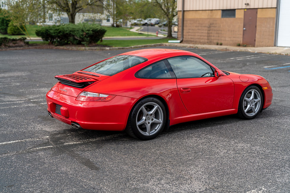 Thumbnail: side view of red 2005 Porsche 997.1 6 Speed