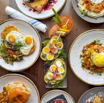 Variety of American brunch dishes on a wooden table