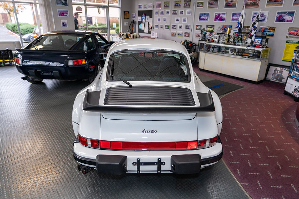 Thumbnail: Back view of white 1988 Porsche 911/930 Turbo 4 Speed