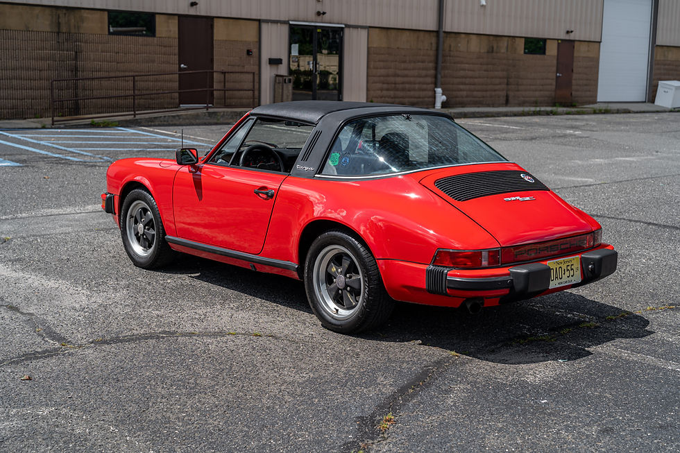Thumbnail: back side view of red 1979 Porsche 911 3.0 SC Targa