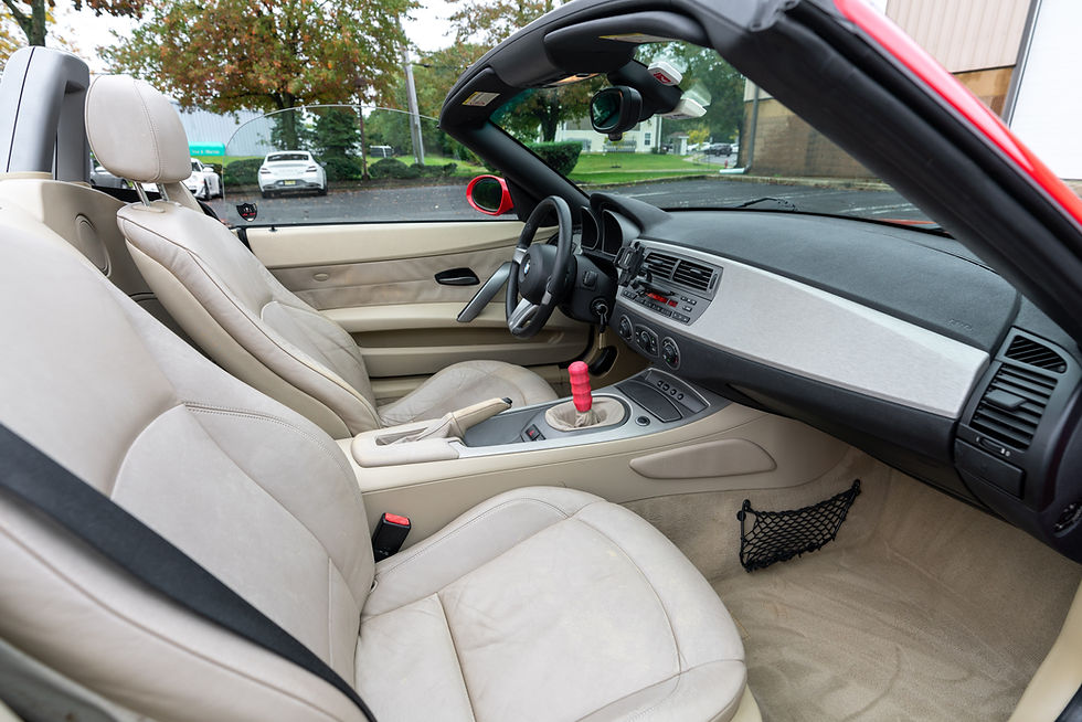 Thumbnail: passenger seat and driver's seat of red 2003 BMW Z4 3.0i 6 Speed Manual