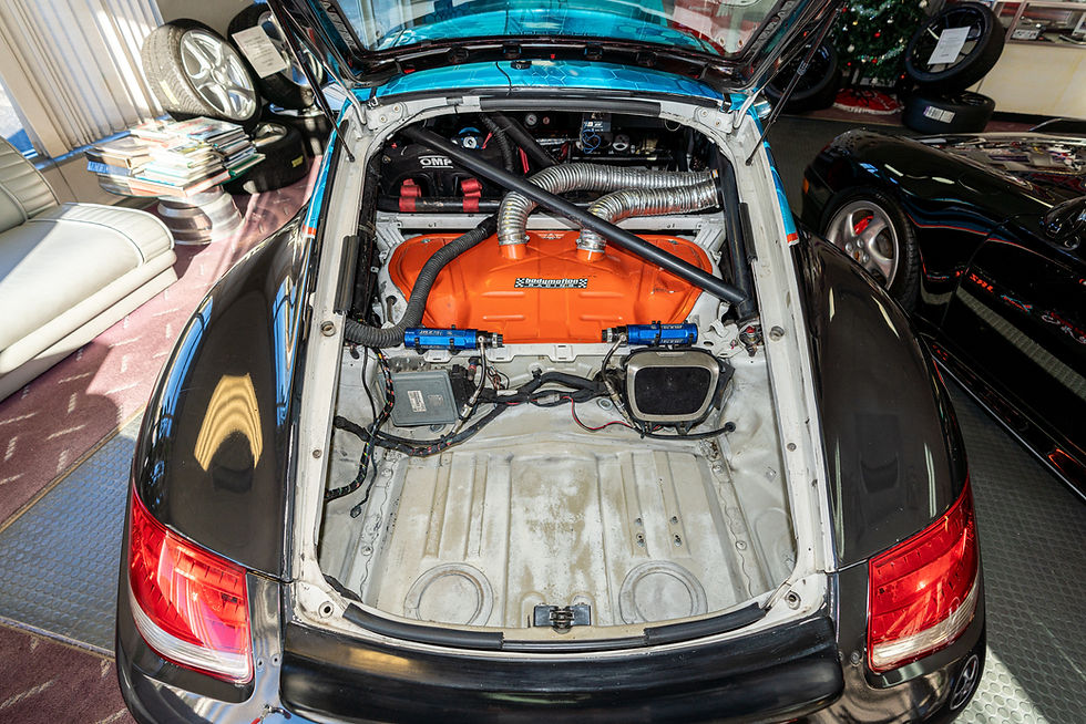 Thumbnail: blue 2012 Cayman S Race Car trunk