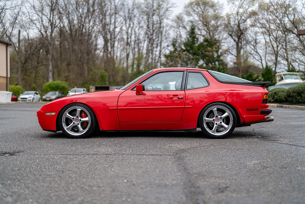 Thumbnail: side view of red 1989 944 T LSX V8 Track Toy