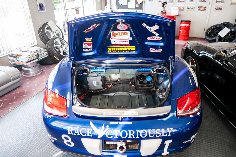 Thumbnail: blue 2009 Boxster S I Class PCA Champion trunk
