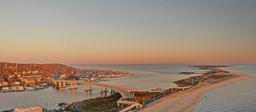 Aerial view of the Sea Bright Bridge and Sandy Hook, New Jersey at sunset