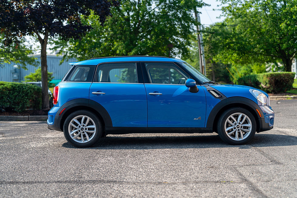Thumbnail: side view of blue 2013 Mini Cooper S ALL4