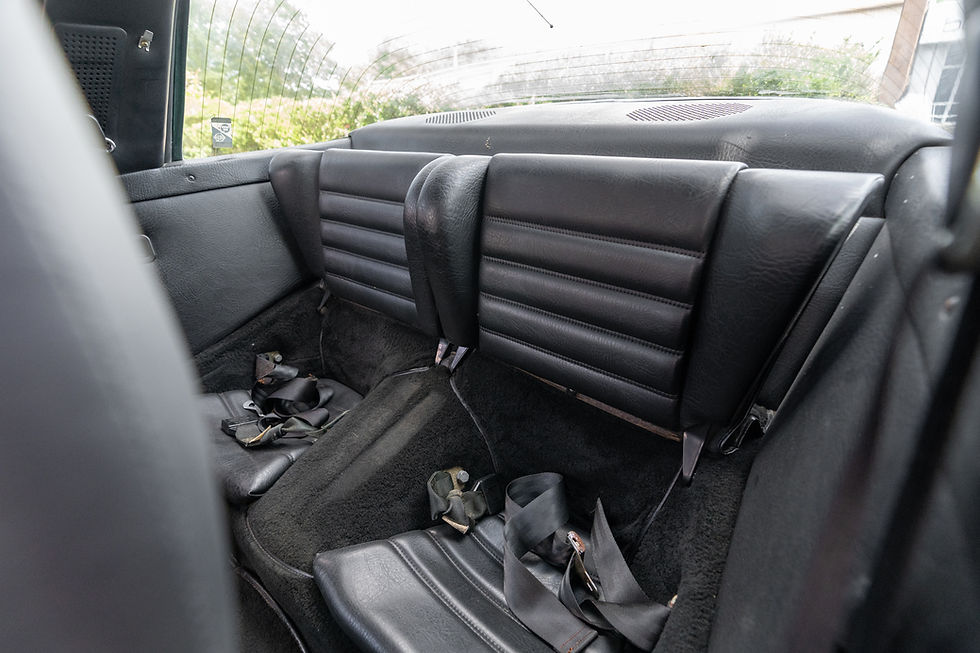 Thumbnail: back seat of red 1979 Porsche 911 3.0 SC Targa