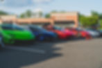 A few of the many exotic cars lined up outside of Gabriella's Italian Steakhouse.