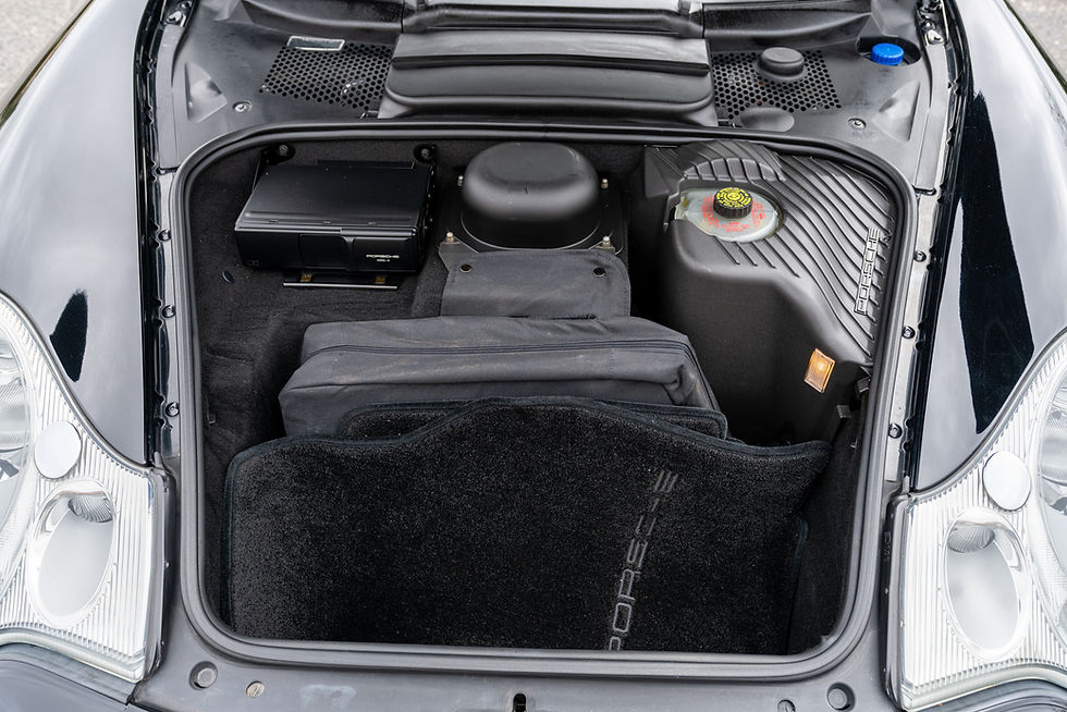 Thumbnail: opened trunk of black 2004 Porsche C4s Cabrio 6Speed