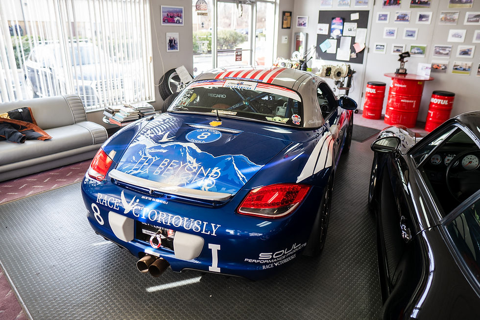Thumbnail: rear view of blue 2009 Boxster S I Class PCA Champion