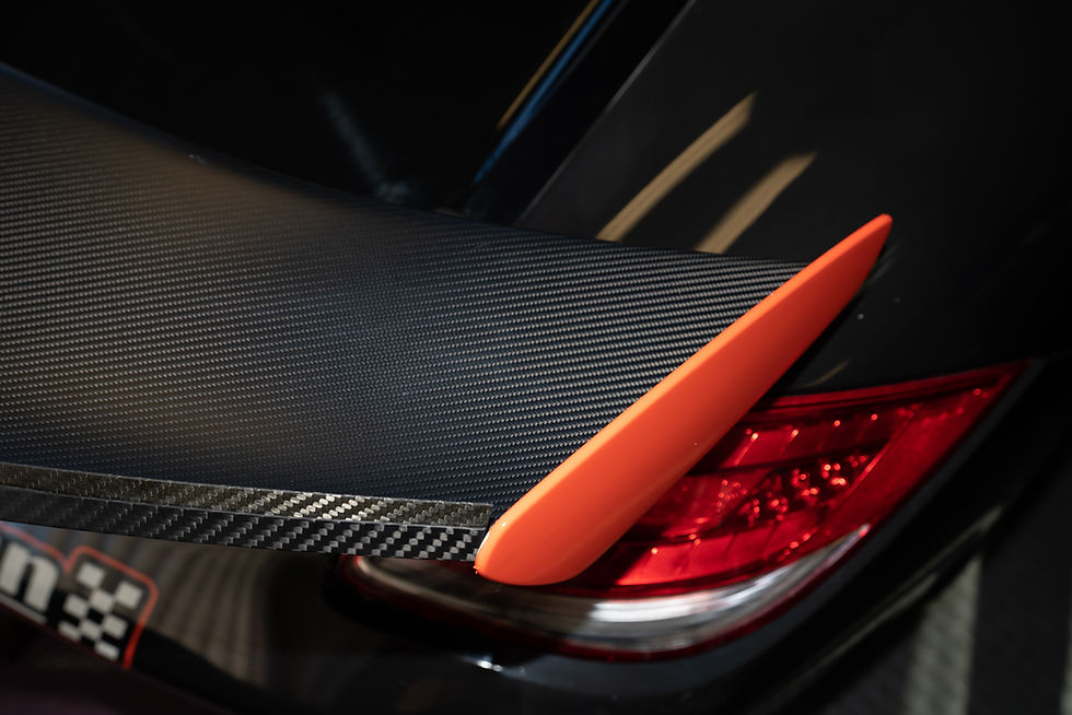 Thumbnail: blue 2012 Cayman S Race Car wing risers