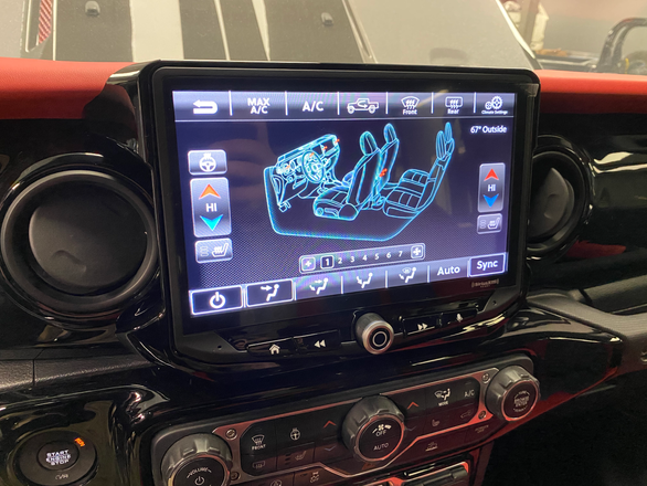 a screen on the dashboard of a car
