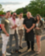 Gabriella's owners and head chef pose with Cars and Socials host outside of Gabriella's Italian Steakhouse.