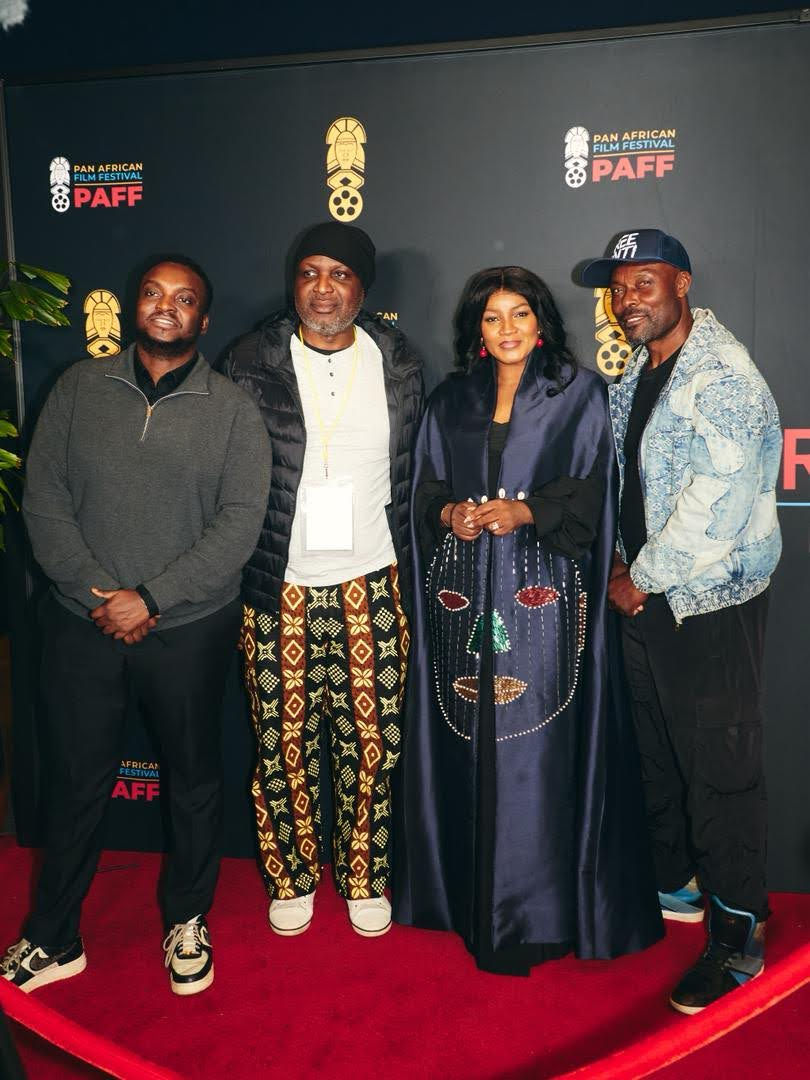 Omotola with contemporaries, including Jimmy Jean Louis (far right). Image: Sammy Oguejiofor