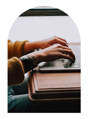 Person typing on laptop