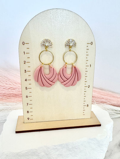 Aria | Polymer Clay Earrings displayed on size board.