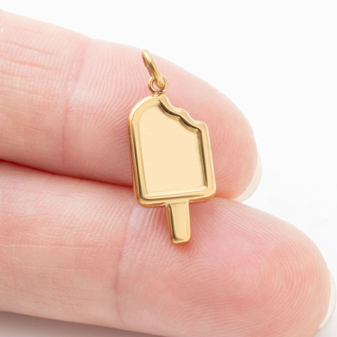 Sweet Treat Popsicle Charm shown in 18K Gold PVD Plated SS on hand for size comparison
