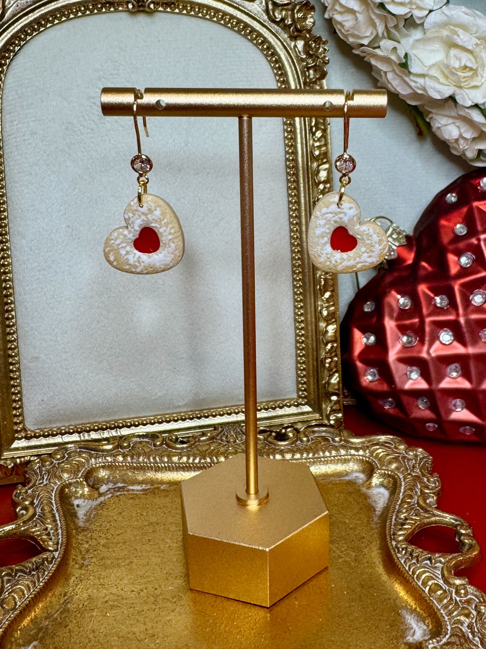 Powdered jelly heart earrings on a gold stand