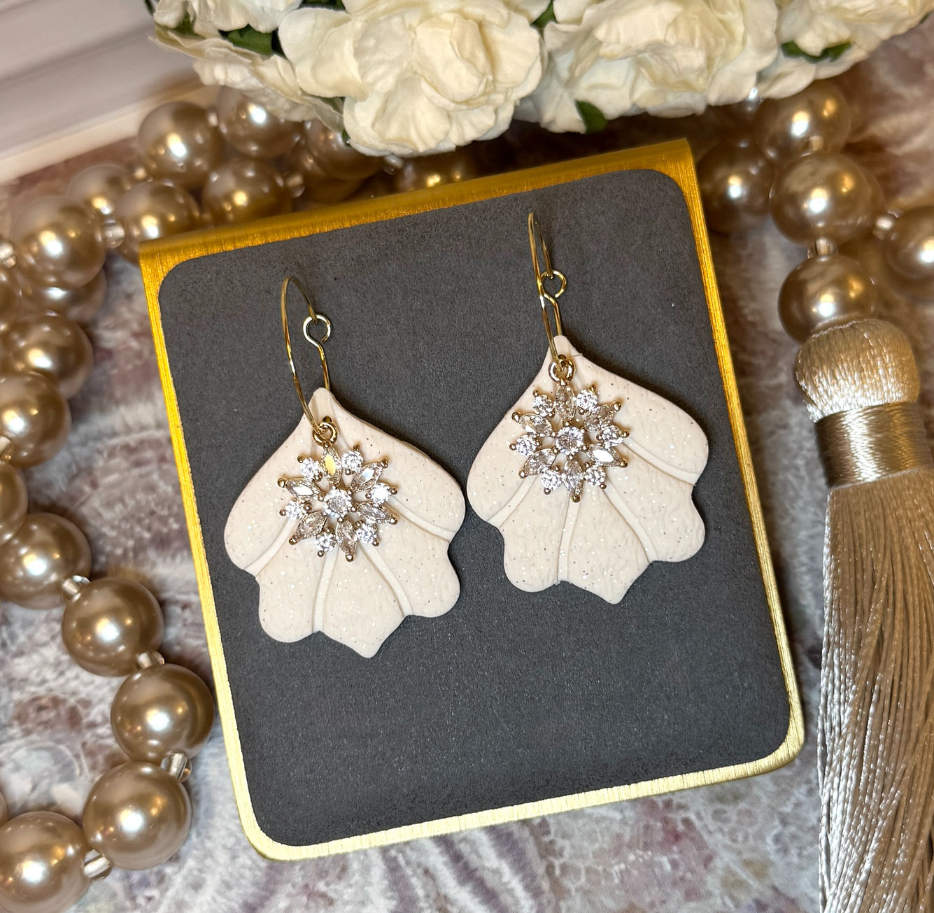Heirloom Glow Drops scalloped earrings with crystal center