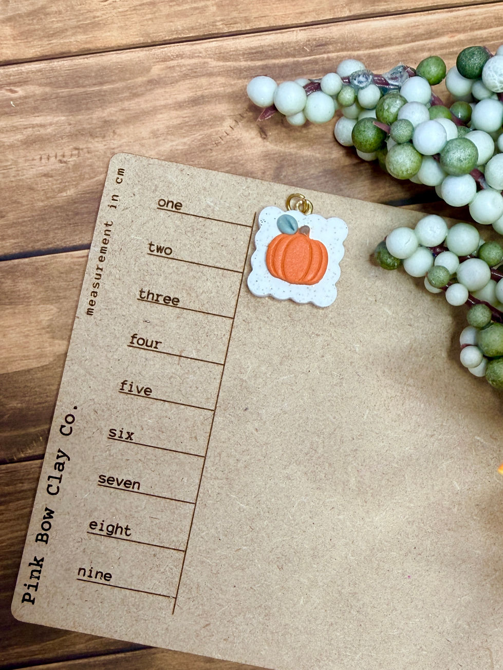 Pumpkin Patch - Polymer Clay Charm shown on size board