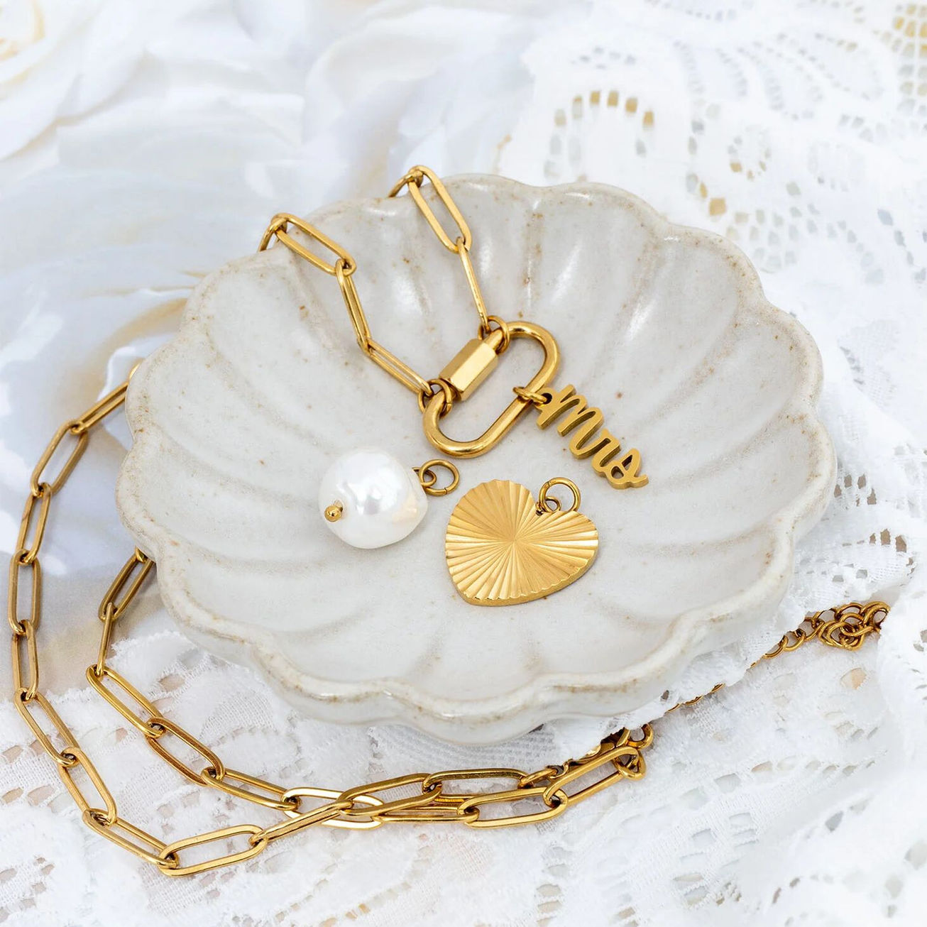 Mrs. Script Word Charm in gold finish shown on carabiner necklace with pearl and heart charms