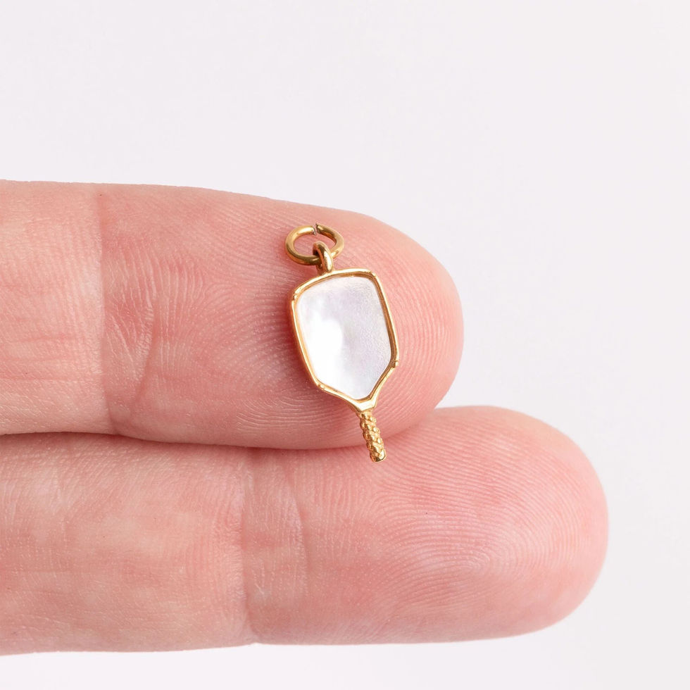 18K Gold PVD Plated Mother of Pearl Pickleball Charm - Size comparison on finger