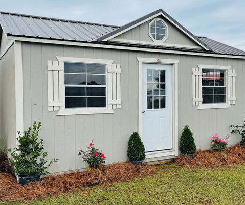 Side Utility shed with sunburst dormer.