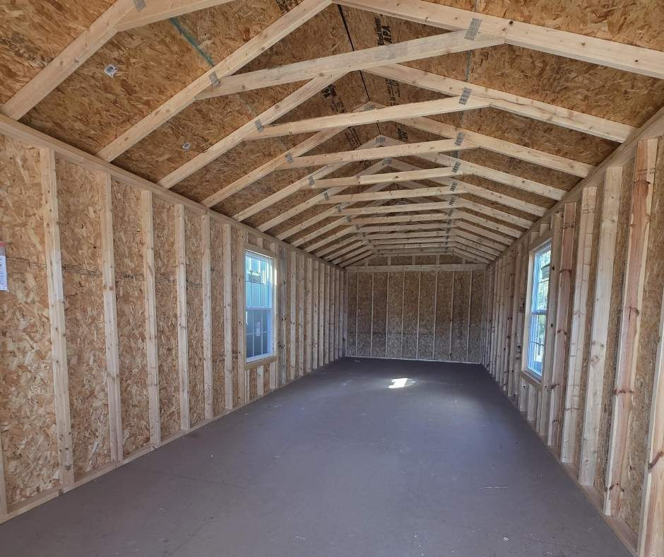 Thumbnail: Long interior view of 12x36 pre-owned cabin showing open space and framing